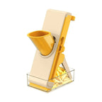 Affettaverdure verticale 4 in 1 color crema e giallo con imbuto, tre lame e contenitore trasparente